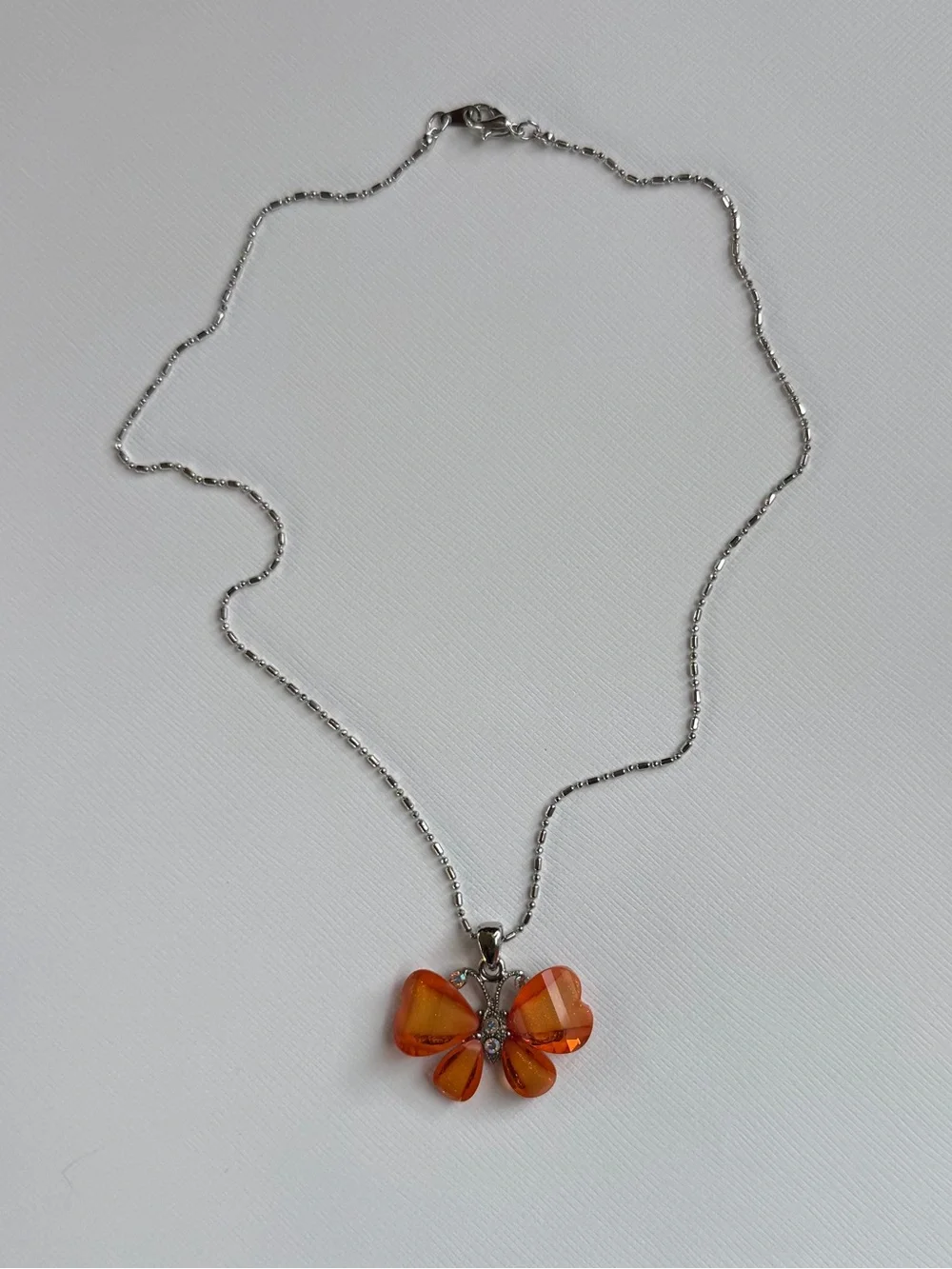 Orange Crystal Butterfly Pendant Necklace – Silver Tone Chain Sparkly Statement
